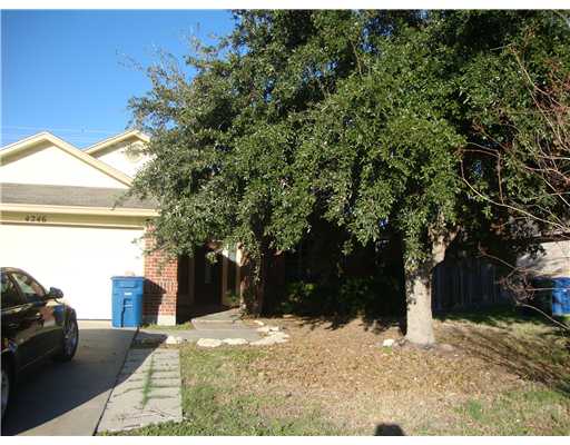 4246 Valley Circle Corpus Christi, TX 78413 - Photo 1 of 7 a view of a backyard with a large tree