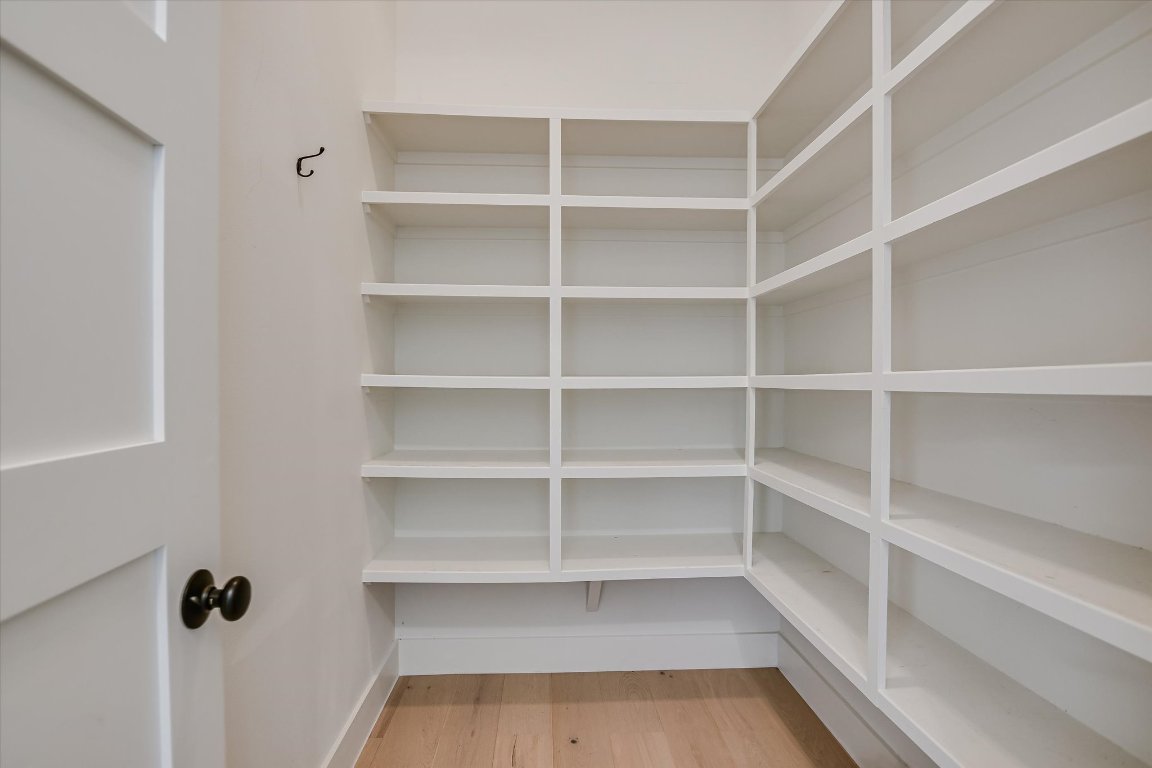 935 Wesley Ridge Drive Spicewood, TX 78669 - Photo 16 of 40 a view of a room with empty racks
