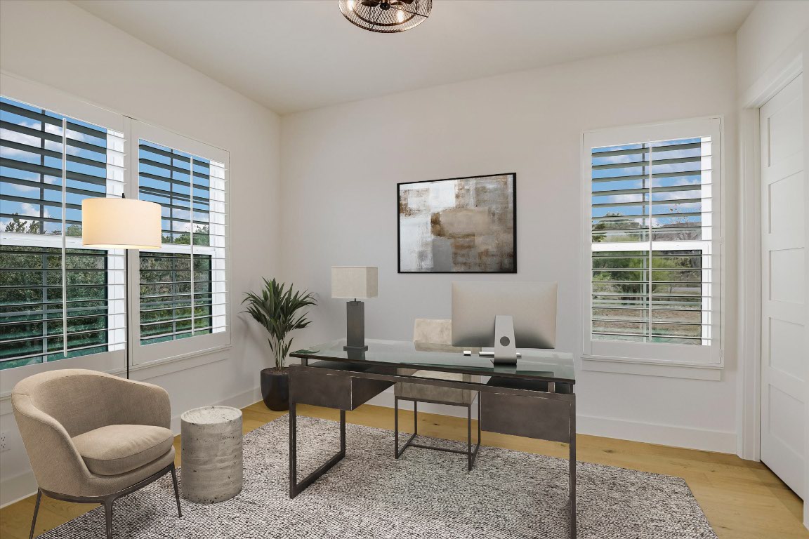 935 Wesley Ridge Drive Spicewood, TX 78669 - Photo 18 of 40 a living room with furniture and a window