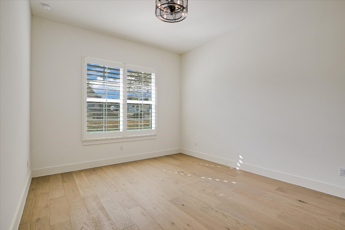 935 Wesley Ridge Drive Spicewood, TX 78669 - Photo 31 of 40 an empty room with a window