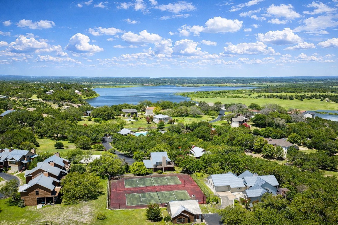 935 Wesley Ridge Drive Spicewood, TX 78669 - Photo 38 of 40 A look at two of the community tennis courts, a favorite among residents.