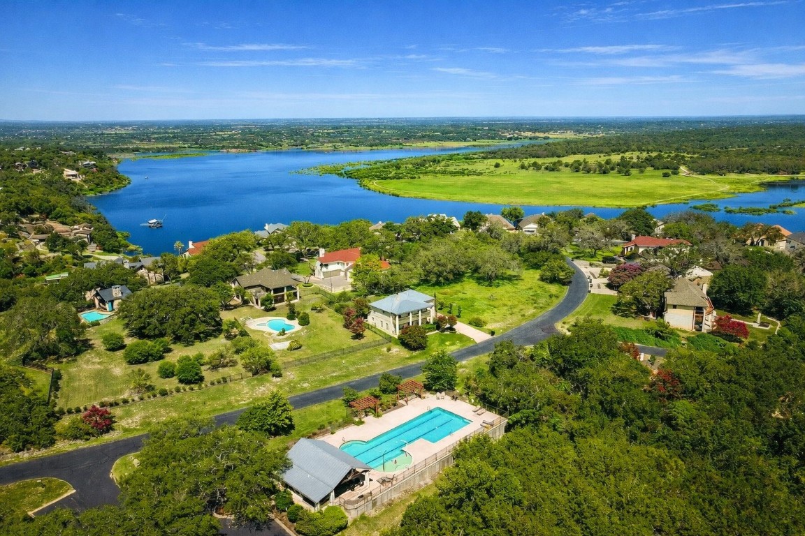935 Wesley Ridge Drive Spicewood, TX 78669 - Photo 39 of 40 Community pool and pavilion. There is a convenient bath/changing room plus a grilling station.