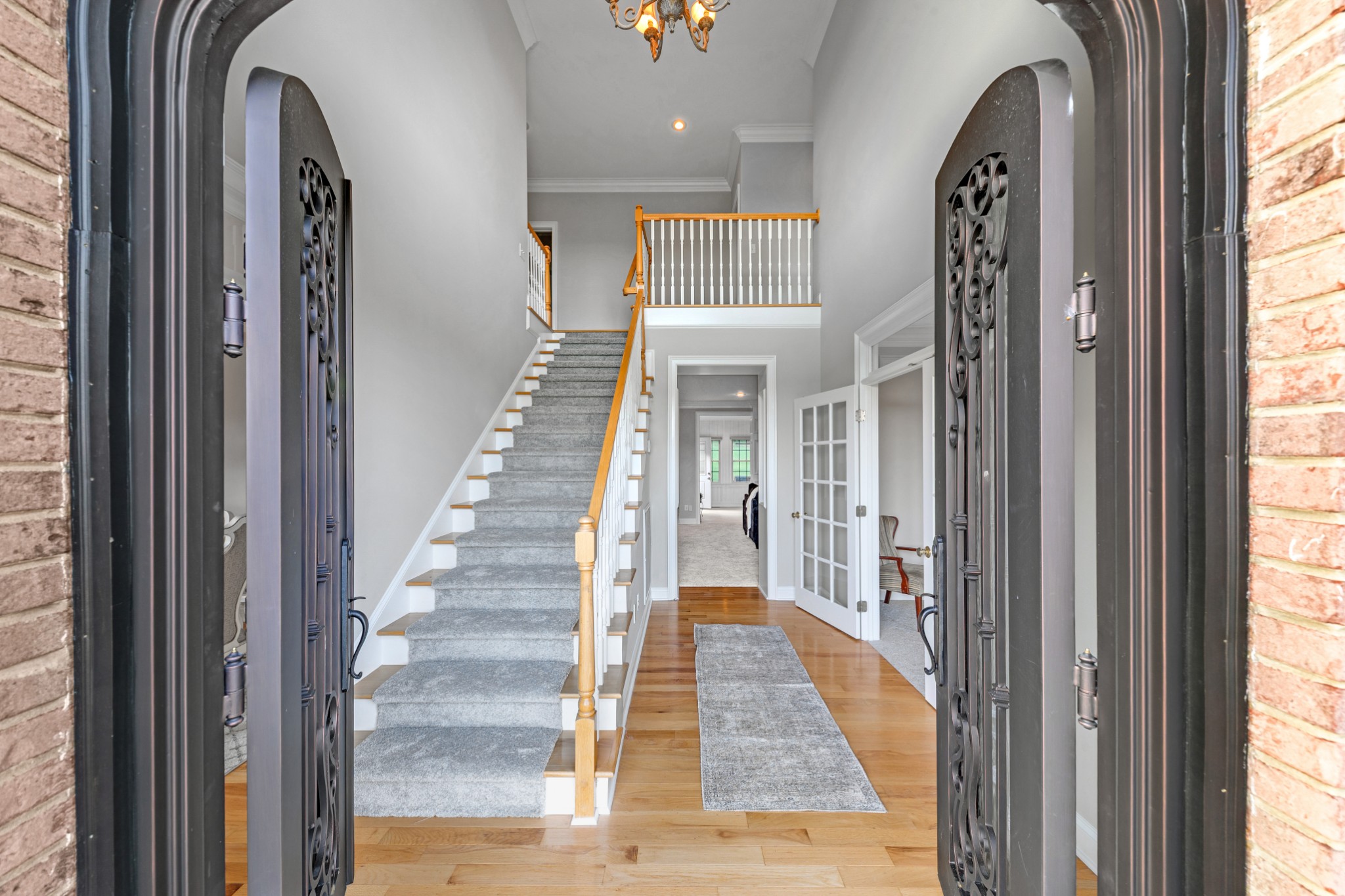 3895 Ostella Road Lewisburg, TN 37091 - Photo 15 of 100 a view of a hallway with wooden floor and windows