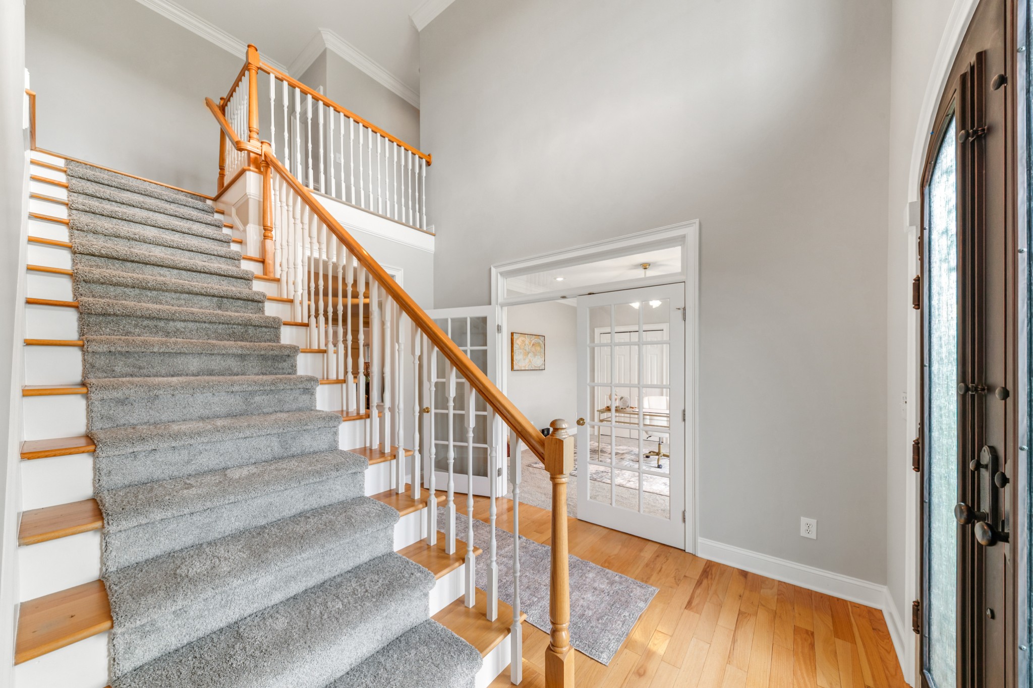 3895 Ostella Road Lewisburg, TN 37091 - Photo 17 of 100 a view of staircase with wooden floor and a rug