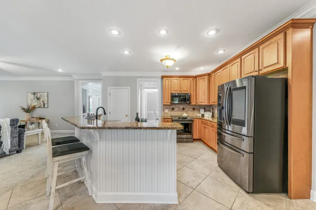 a view of an empty room and a window