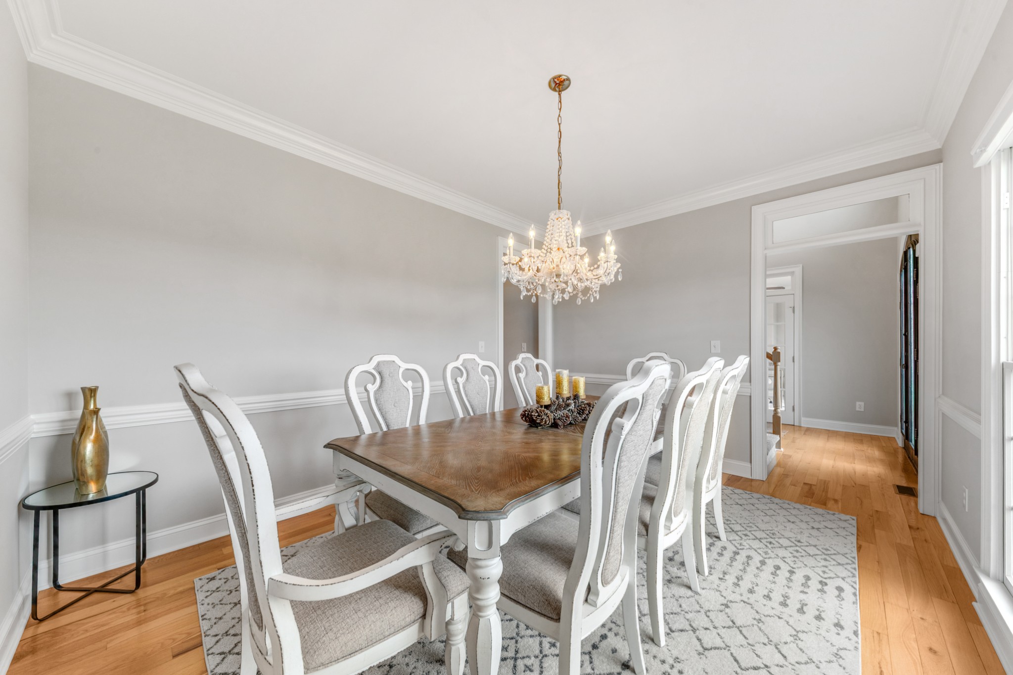 3895 Ostella Road Lewisburg, TN 37091 - Photo 35 of 100 a view of a dining room with furniture a chandelier and wooden floor