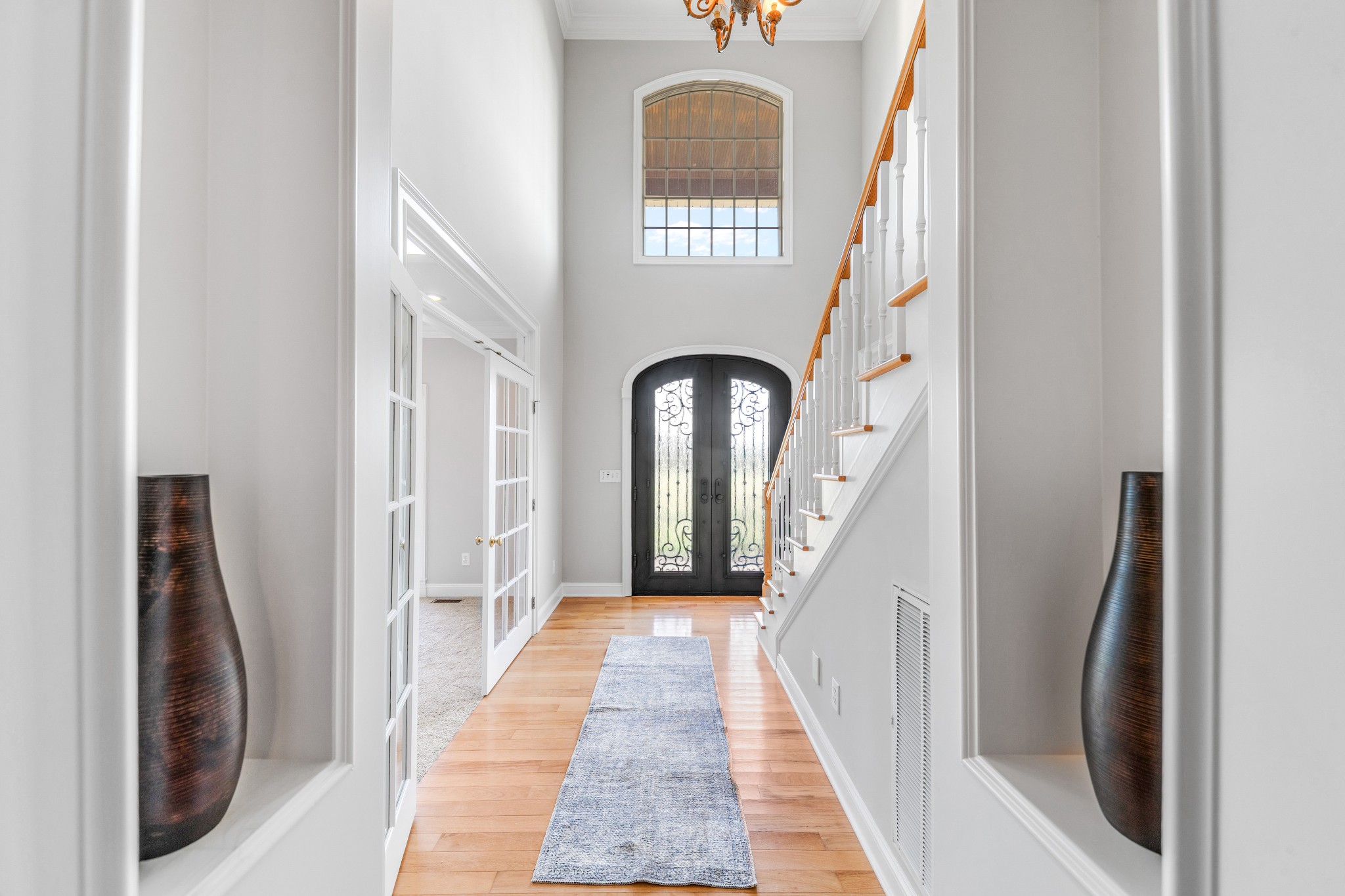 3895 Ostella Road Lewisburg, TN 37091 - Photo 46 of 100 a view of a hallway with windows and wooden floor