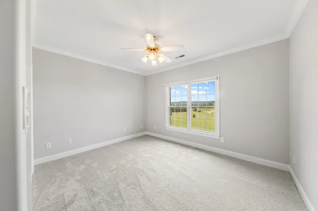 a view of a garage with a bike and wooden roof
