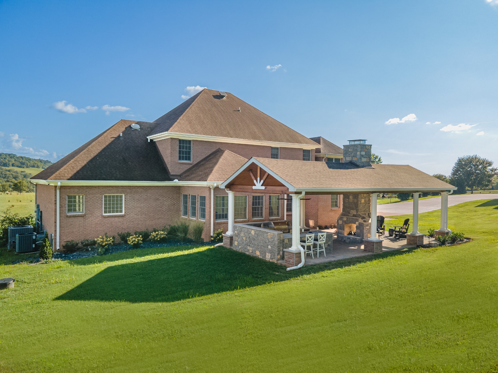3895 Ostella Road Lewisburg, TN 37091 - Photo 83 of 100 a front view of a house with a garden and trees