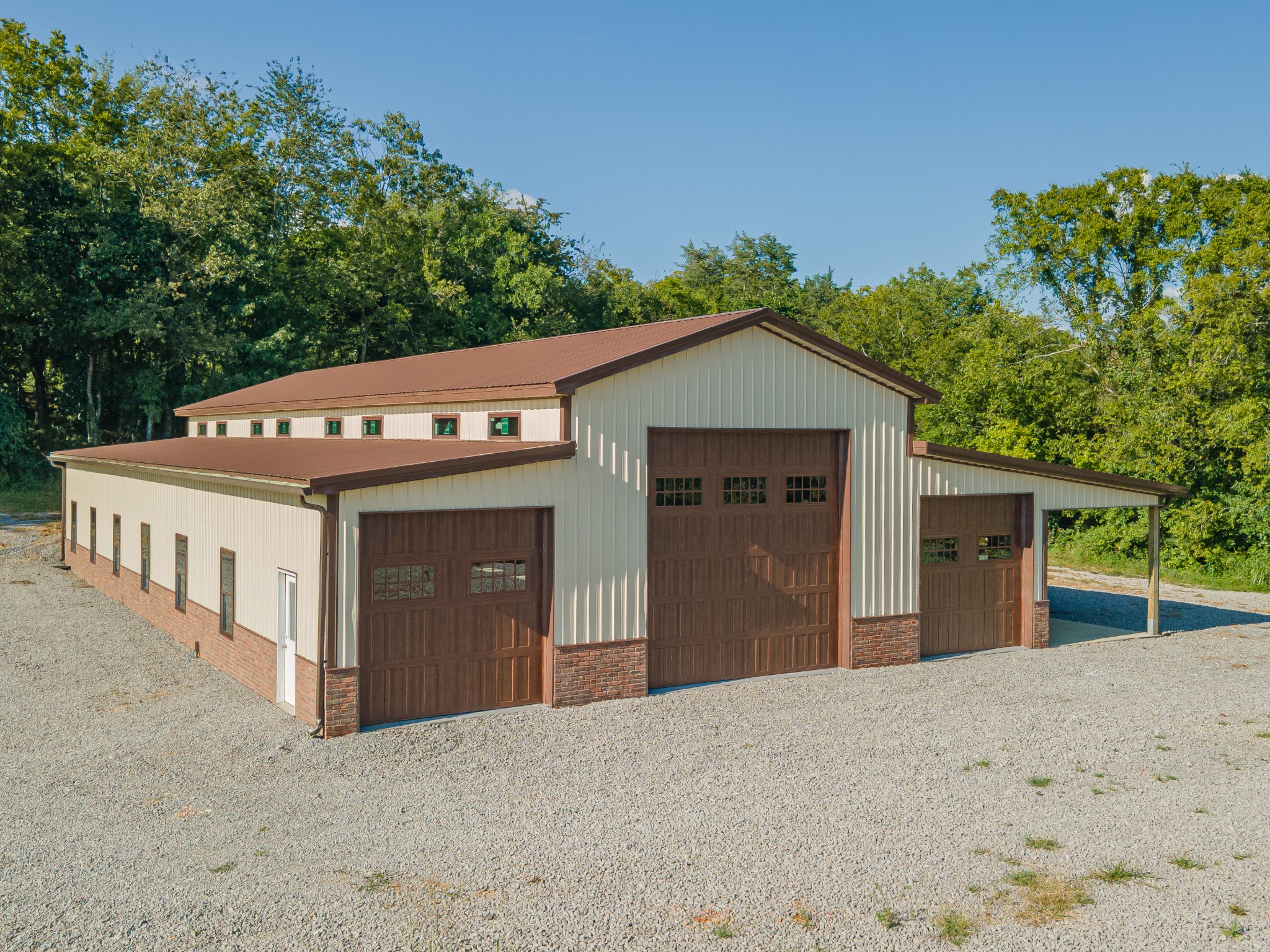 3895 Ostella Road Lewisburg, TN 37091 - Photo 91 of 100 a view of a house with a yard and garage