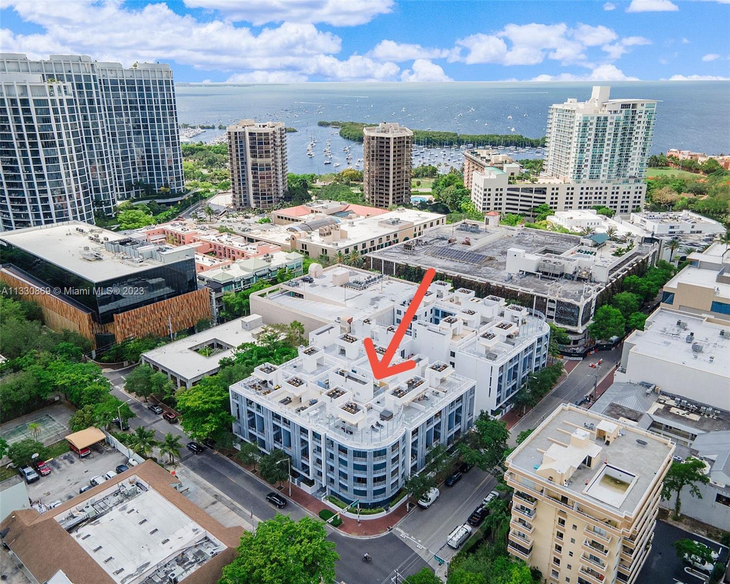 3339 Virginia Street, Unit PH26 Miami, FL 33133 - Photo 1 of 19 a view of a dinning table and chairs in the patio