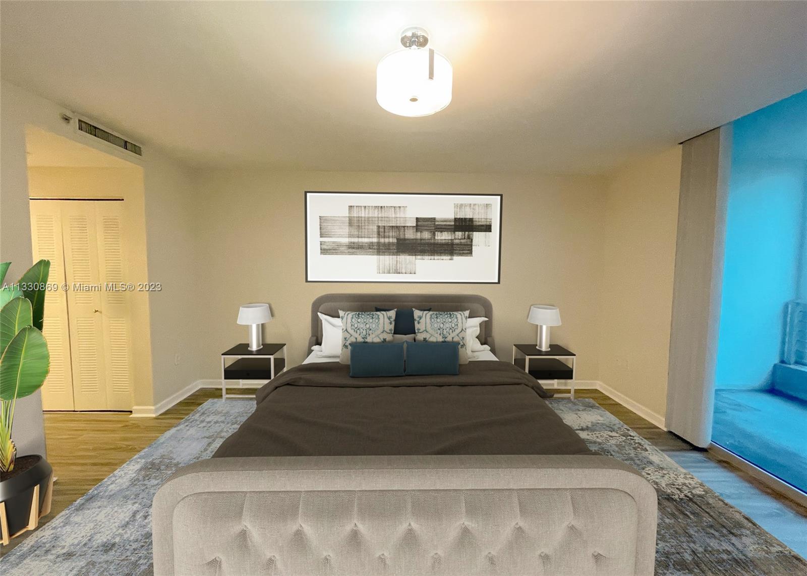3339 Virginia Street, Unit PH26 Miami, FL 33133 - Photo 16 of 19 a bedroom with a large bed and a window