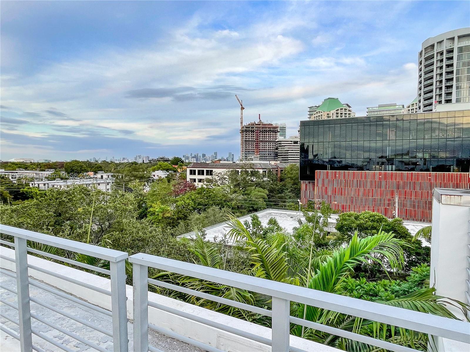 3339 Virginia Street, Unit PH26 Miami, FL 33133 - Photo 19 of 19 a view of a city from a balcony