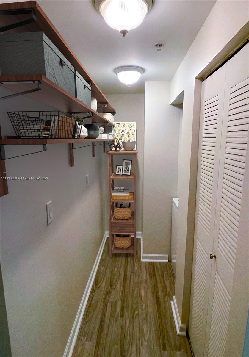 3339 Virginia Street, Unit PH26 Miami, FL 33133 - Photo 7 of 19 a view of a walk in closet