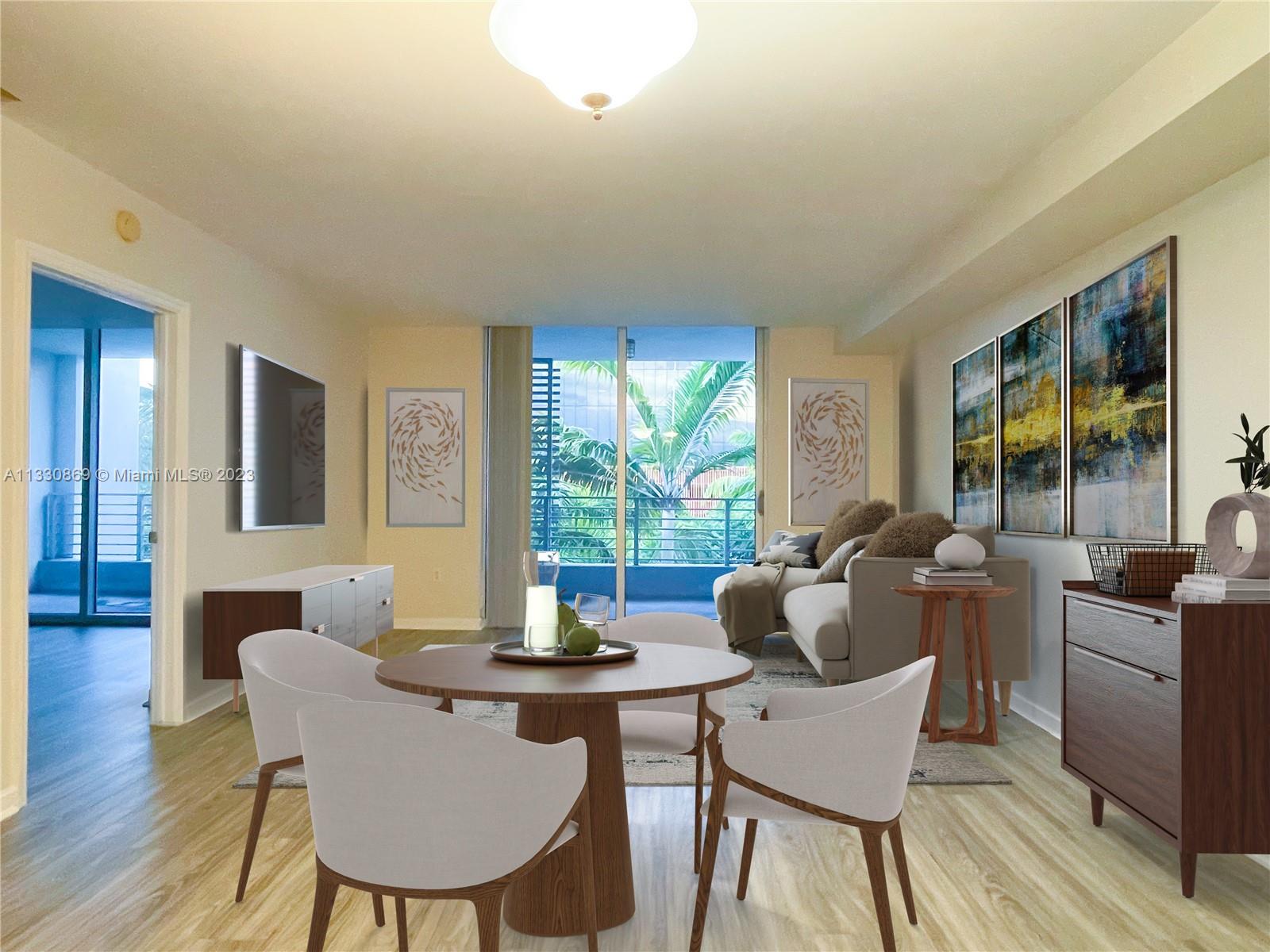 3339 Virginia Street, Unit PH26 Miami, FL 33133 - Photo 9 of 19 a dining room with furniture and wooden floor