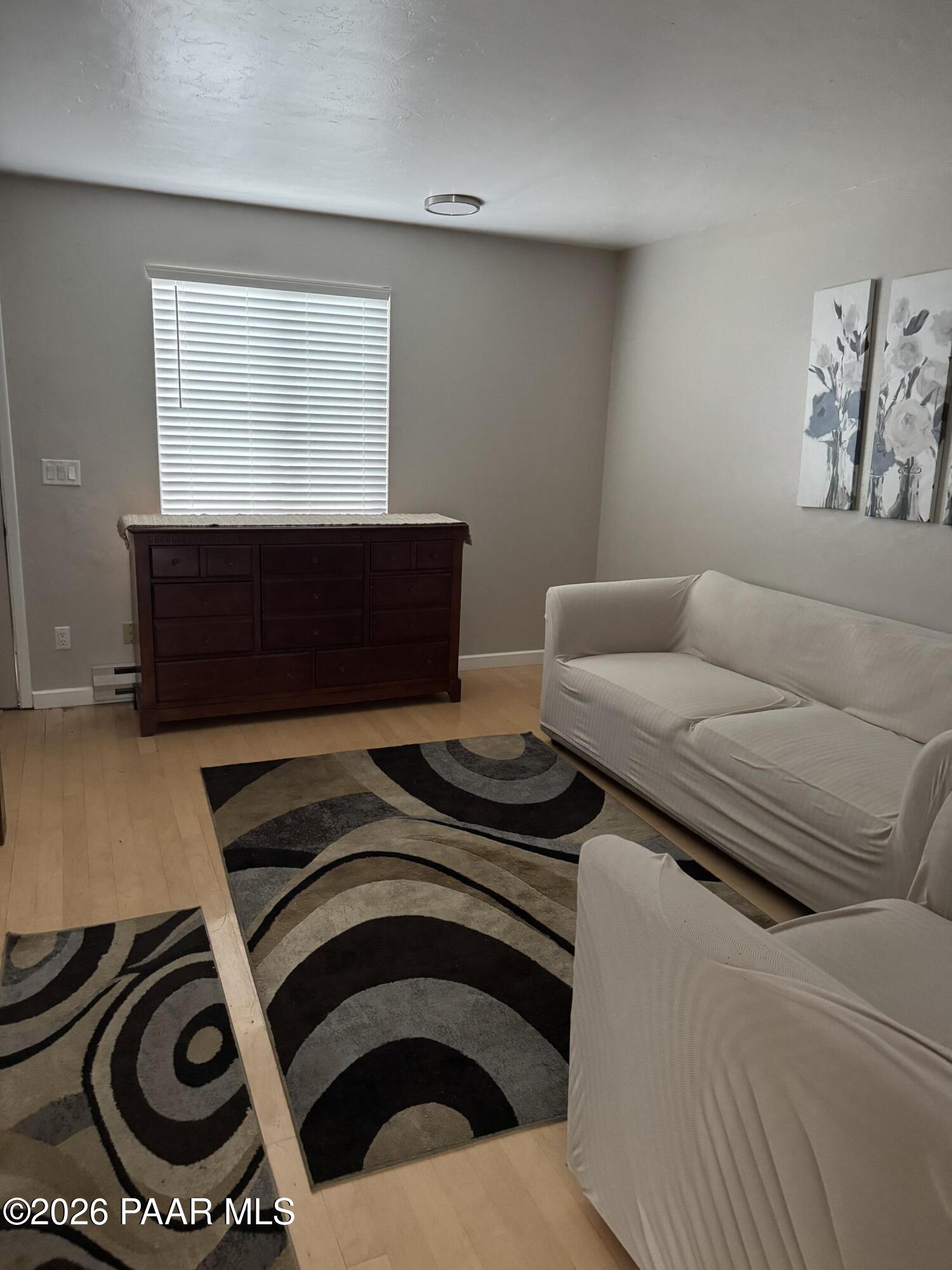 845 Sunset Avenue, Unit D Prescott, AZ 86305 - Photo 7 of 10 a bedroom with a bed and a window