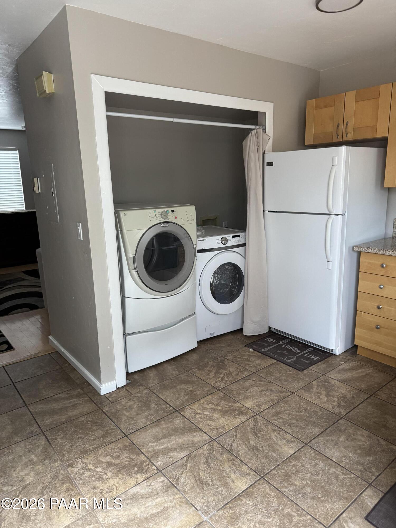 845 Sunset Avenue, Unit D Prescott, AZ 86305 - Photo 10 of 10 a utility room with dryer and washer