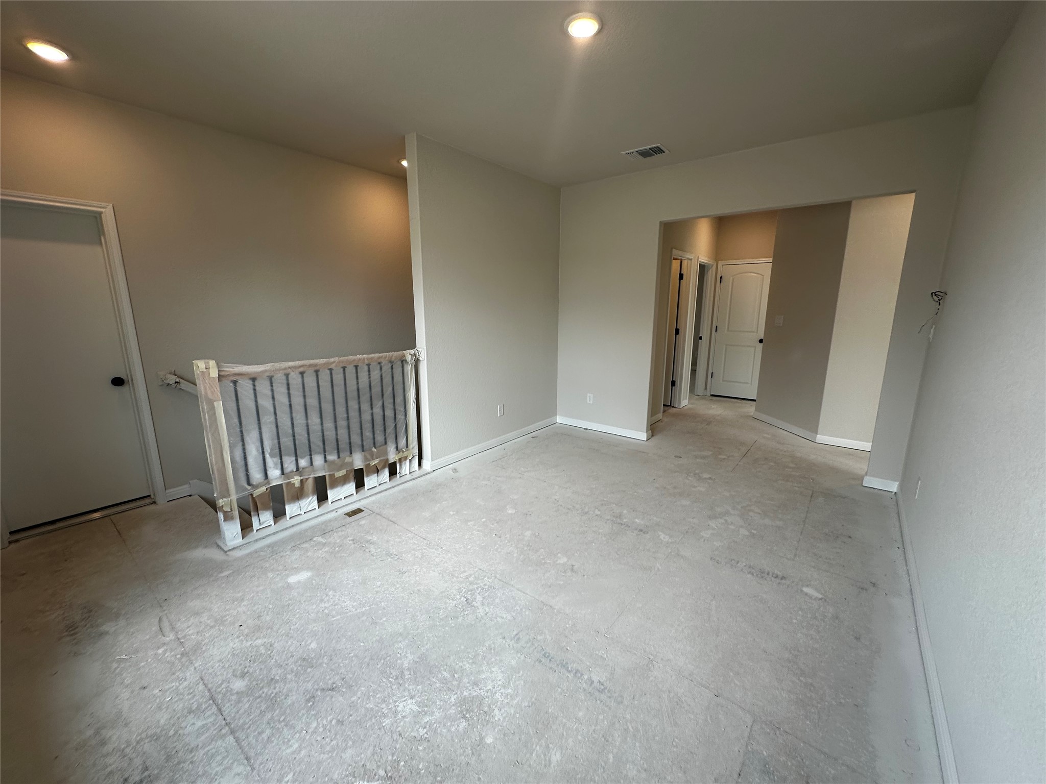 1053 Sienna Bear Road Georgetown, TX 78633 - Photo 19 of 32 a view of an empty room with glass door