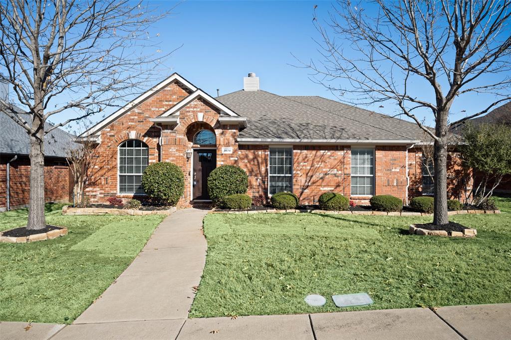 1034 Colleton Lane Frisco, TX 75033 - Photo 1 of 1 a front view of a house with a yard