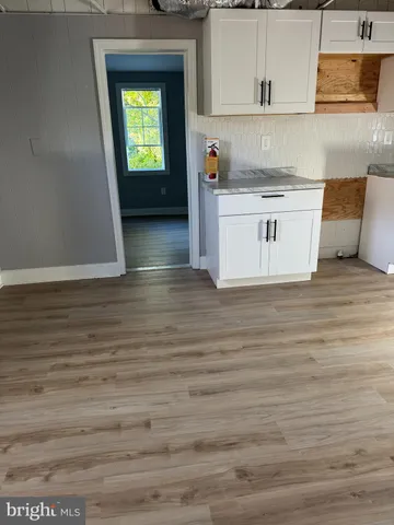 a view of kitchen and microwave