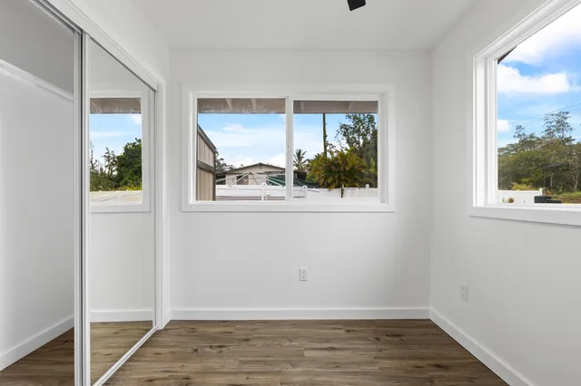 a view of a room that has a window in it