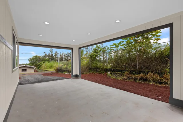 a view of a garden with an outdoor space