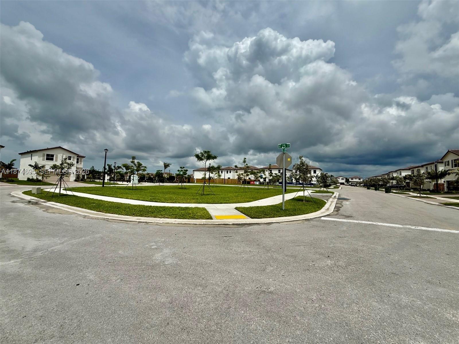 2600 Southeast 25th Street Homestead, FL 33035 - Photo 20 of 61 a view of a house with swimming pool and yard