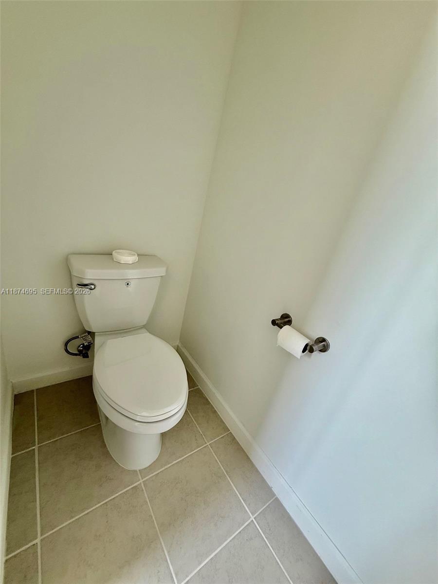 2600 Southeast 25th Street Homestead, FL 33035 - Photo 33 of 61 a bathroom with a toilet