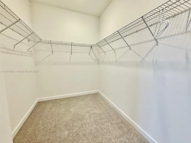 an empty room with a bench