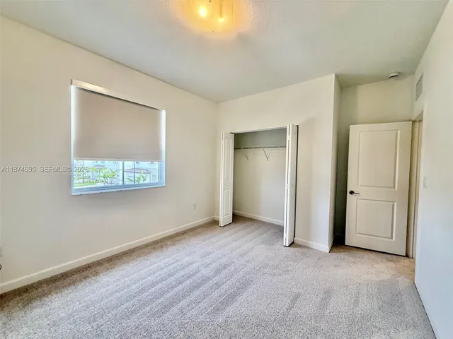 a view of a livingroom with wooden floor