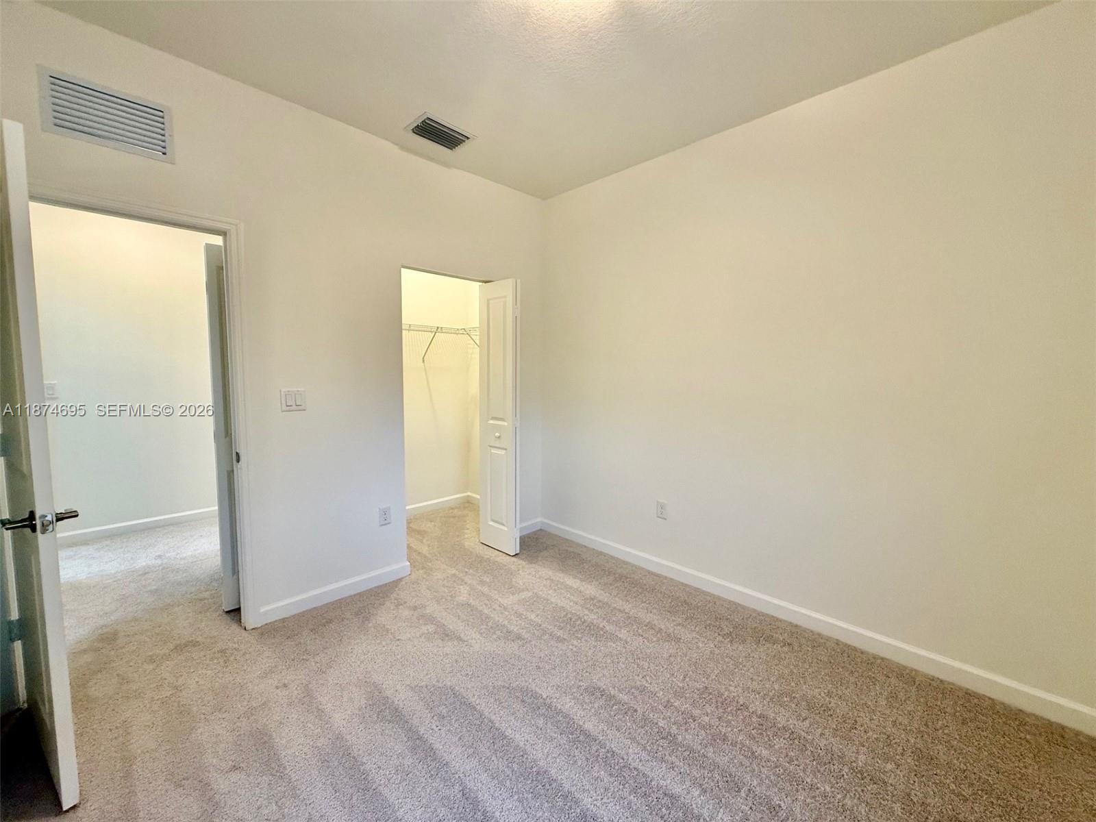 2600 Southeast 25th Street Homestead, FL 33035 - Photo 44 of 61 an empty room with a natural light