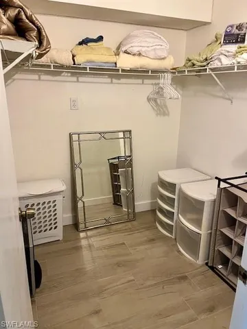 a view of a room with racks on the wall