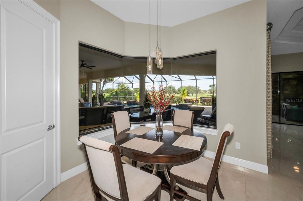 9829 Milano Drive Trinity, FL 34655 - Photo 33 of 100 a view of a dining room with furniture window and outside view