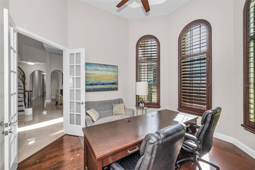 9829 Milano Drive Trinity, FL 34655 - Photo 50 of 100 a view of a dining room with furniture and wooden floor