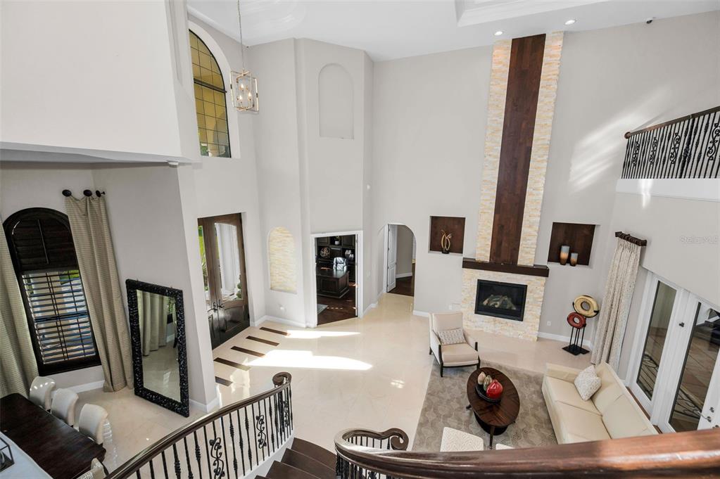 9829 Milano Drive Trinity, FL 34655 - Photo 70 of 100 a living room with furniture and a flat screen tv