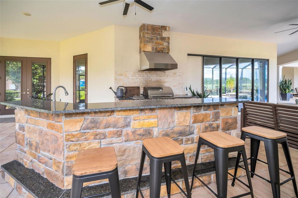 9829 Milano Drive Trinity, FL 34655 - Photo 80 of 100 a view of a dining room with furniture and window