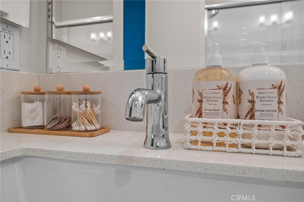 9040 Garvey Avenue, Unit 5 Rosemead, CA 91770 - Photo 23 of 33 a bathroom with a sink and mirror