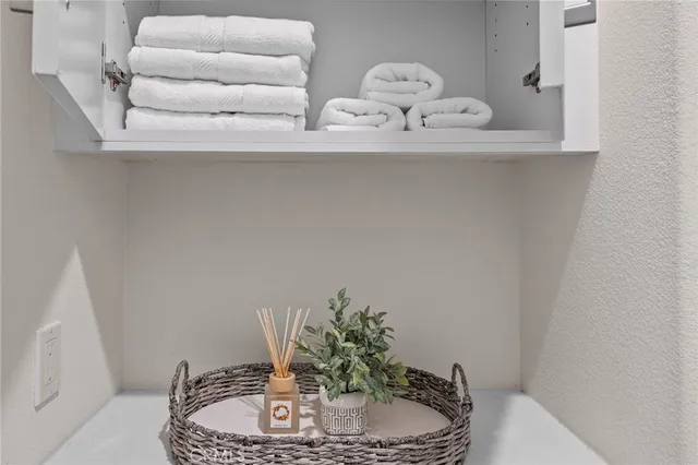 a bedroom with a bed and a chair