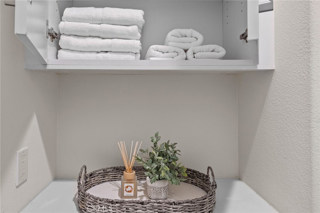 9040 Garvey Avenue, Unit 5 Rosemead, CA 91770 - Photo 28 of 33 a potted plant sitting on top of a shelf