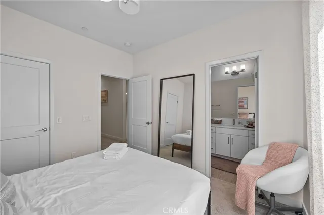 a bathroom with a sink a toilet and a shower