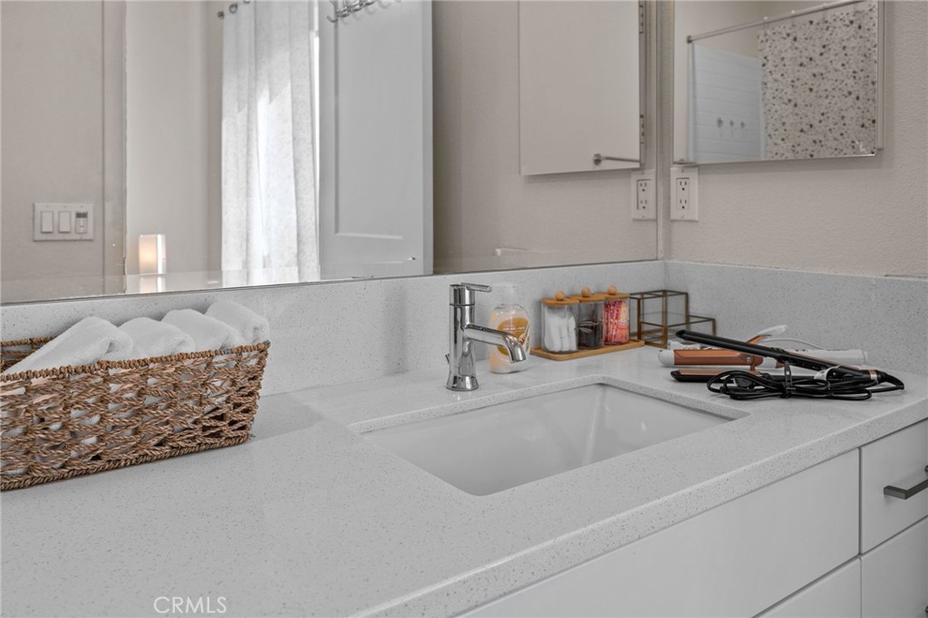 9040 Garvey Avenue, Unit 5 Rosemead, CA 91770 - Photo 31 of 33 a kitchen with a sink and cabinets