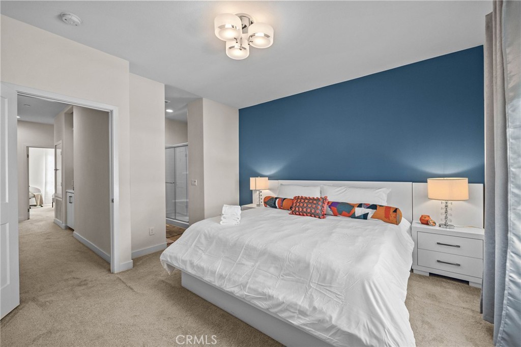 9040 Garvey Avenue, Unit 5 Rosemead, CA 91770 - Photo 33 of 33 a bedroom with a bed and a walk in closet