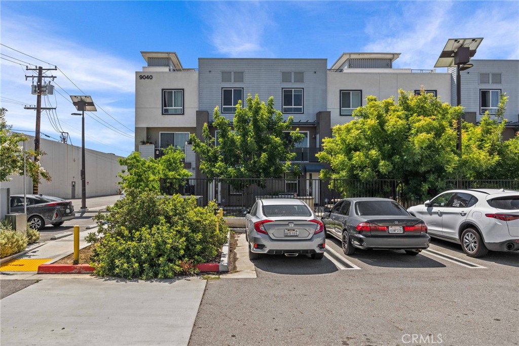 9040 Garvey Avenue, Unit 5 Rosemead, CA 91770 - Photo 4 of 33 a view of a cars park in front of a building