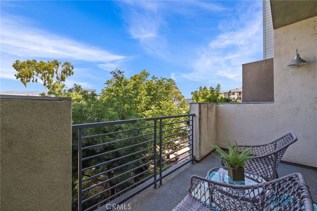 9040 Garvey Avenue, Unit 5 Rosemead, CA 91770 - Photo 9 of 33 a view of a chairs and table in the balcony