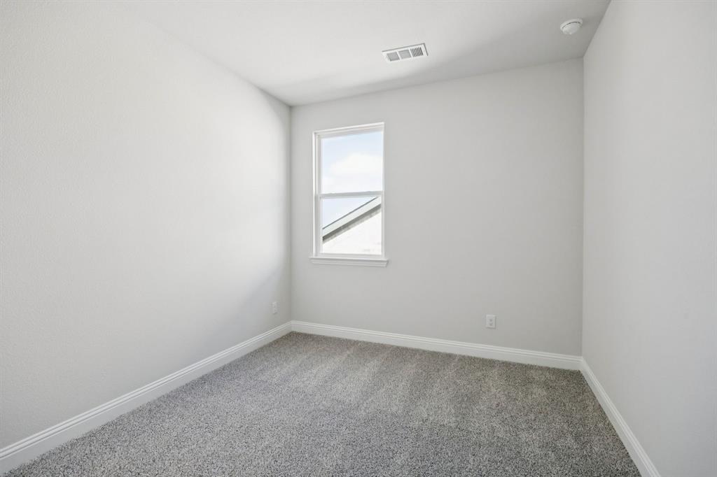 529 Magellan Road Seagoville, TX 75159 - Photo 15 of 37 an empty room with a window