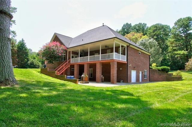 165 Regency Road Salisbury, NC 28147 - Photo 38 of 47 a view of a big house with a big yard and large trees