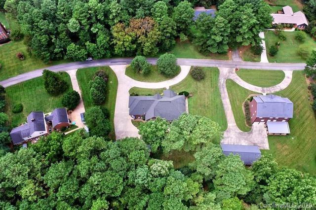165 Regency Road Salisbury, NC 28147 - Photo 6 of 47 an aerial view of a house with a swimming pool outdoor seating and yard