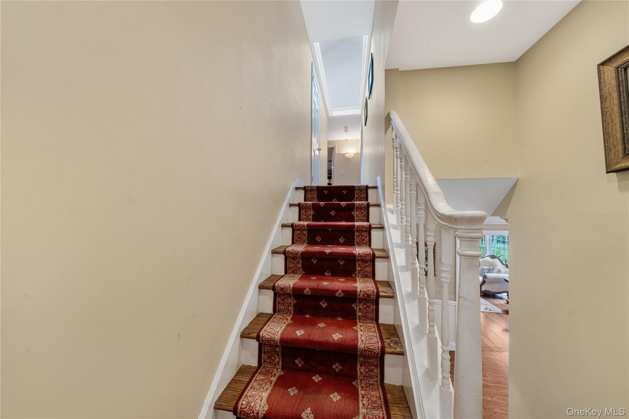 51 Bay Road Huntington Bay, NY 11743 - Photo 18 of 42 Stairway with wood finished floors and baseboards