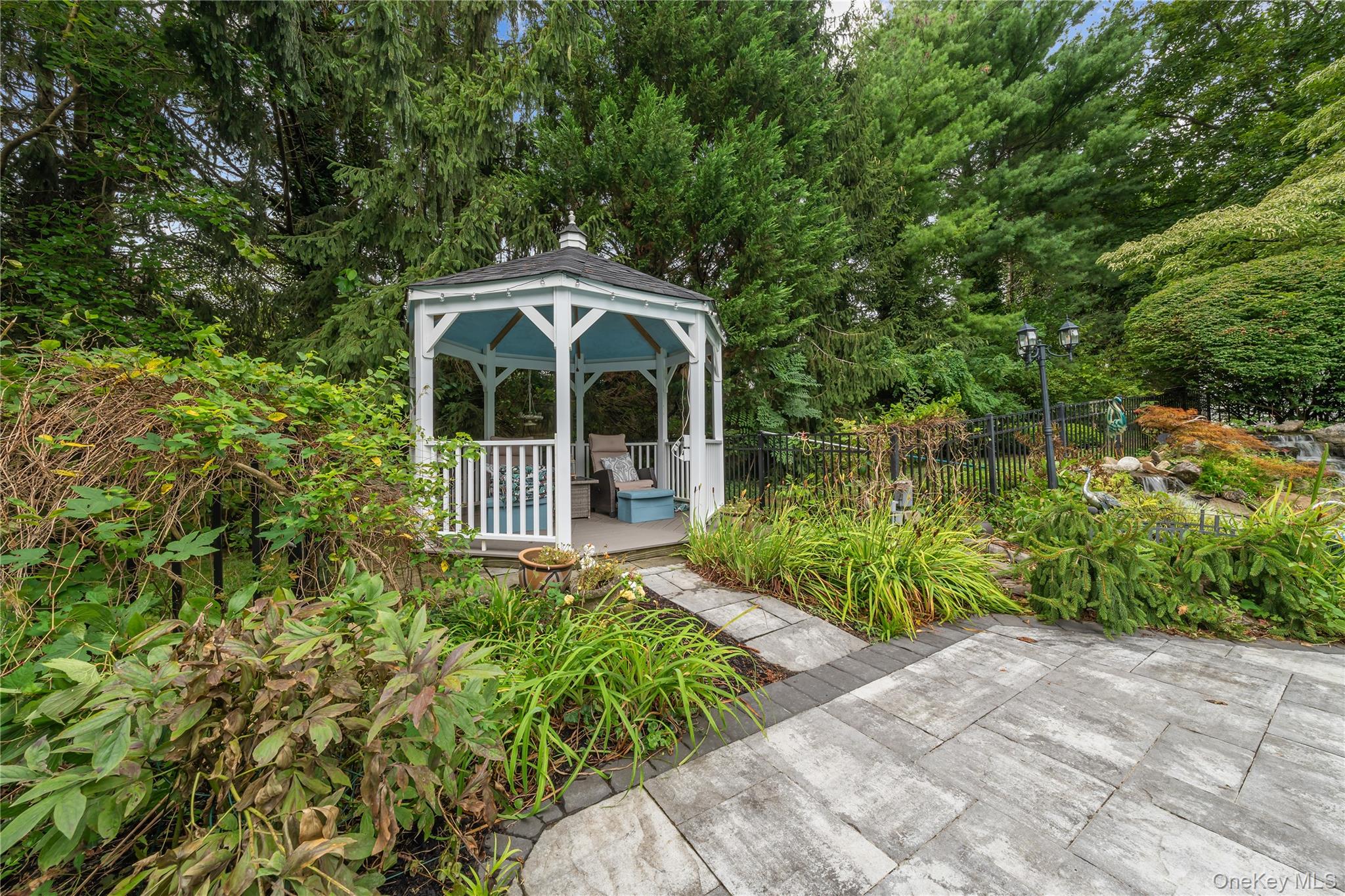 51 Bay Road Huntington Bay, NY 11743 - Photo 35 of 42 a front view of a house with a yard