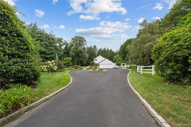 a view of a road with a yard